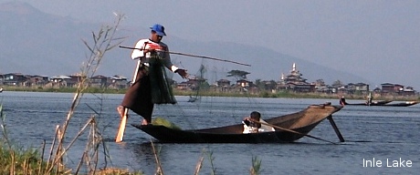 Unique Style of boat rowing in Inle Lake.