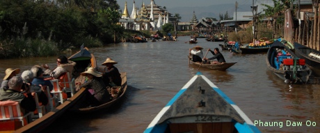 Tourists on boat trip to Phaung Daw Oo, Inle.